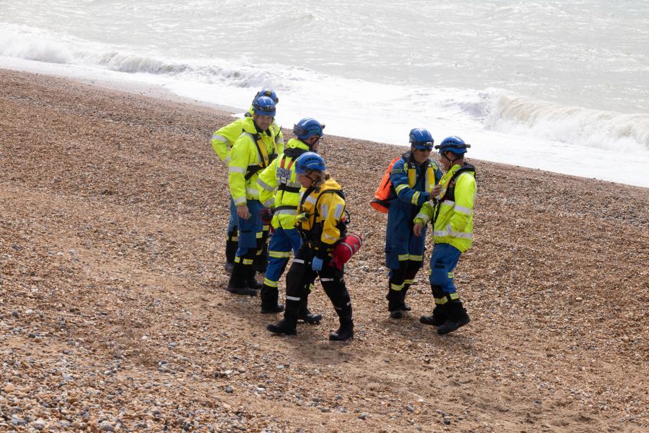 Coastguards and police searching Brighton Beach after three women's bodies were recovered from the sea.