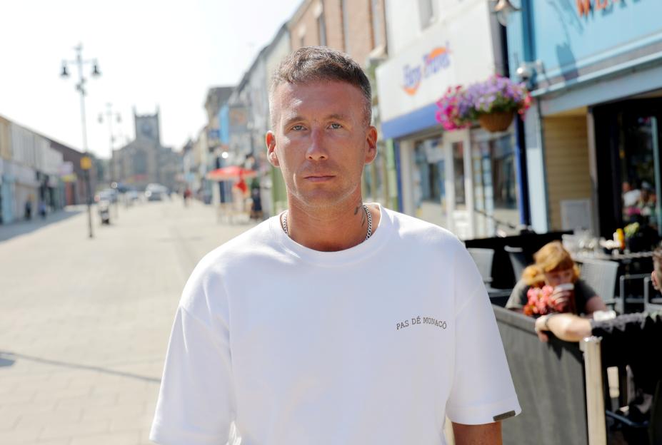 A man stands outside in Seaham, County Durham, where residents are concerned about Fentanyl-laced vapes.
