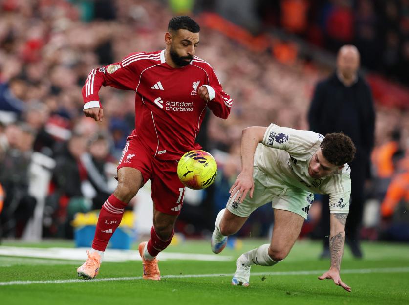 Liverpool's Mohamed Salah in action with Nottingham Forest's Neco Williams.