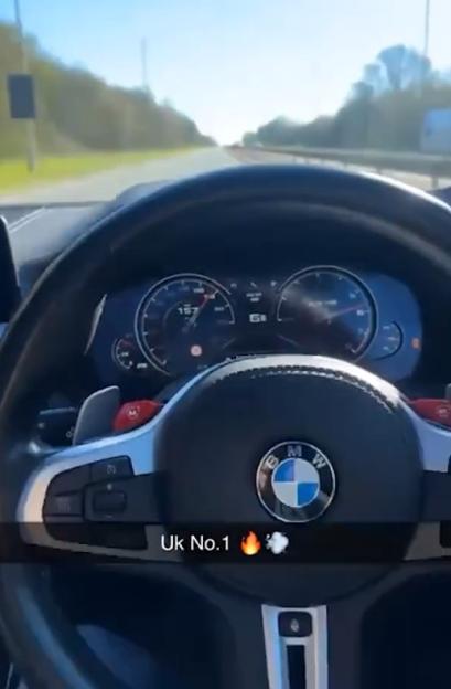 View from inside a BMW X3M Competition showing the speedometer at 157 mph, with text "Uk No.1".