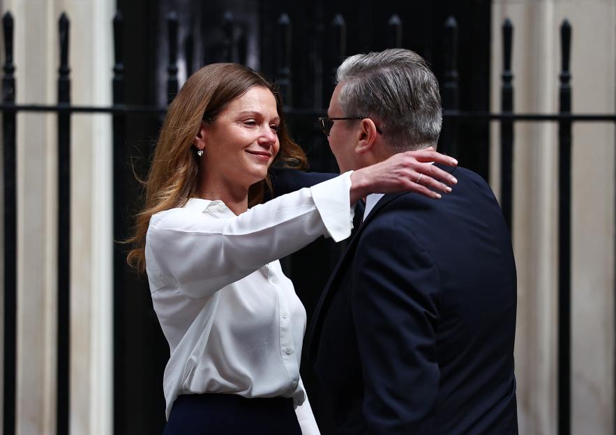 Prime Minister Keir Starmer hugging his wife, Victoria Starmer, outside No.10 Downing Street.