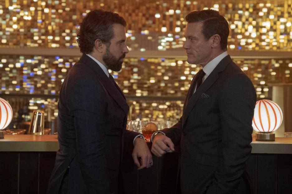 Tom Cullen as Ben Fitzmaurice and Luke Evans as Martin Gilmour in The Party.