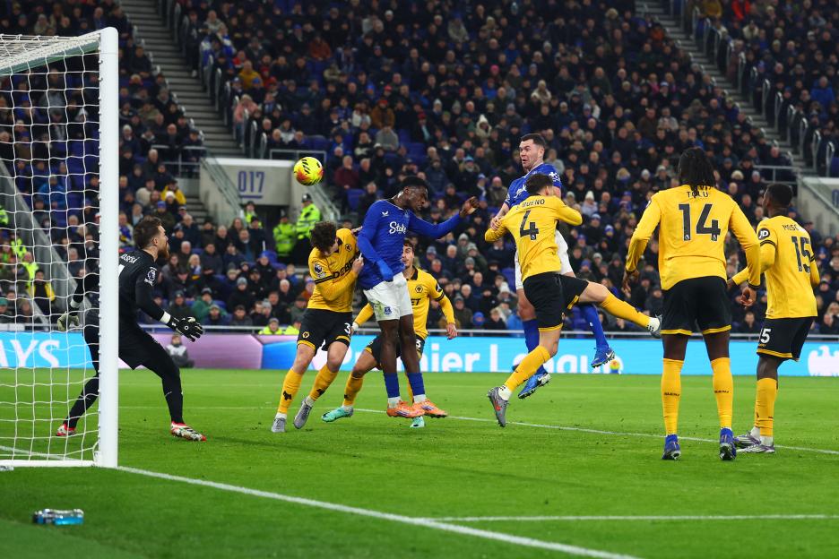 Michael Keane of Everton heads against the post during a football match.