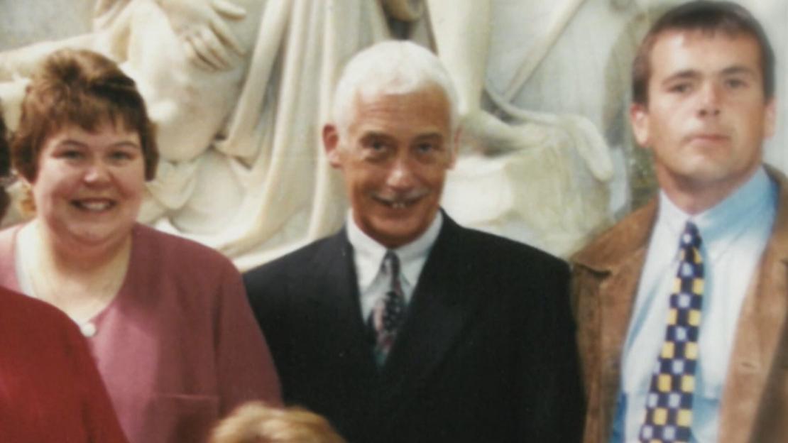 Lynn, David, and Simon at a christening.