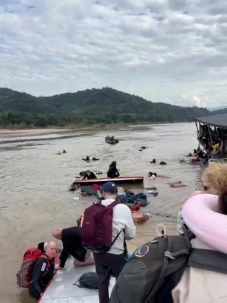 Shocking footage shows tourists cry for help as water submerges sinking Laos ferry