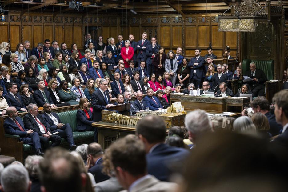 Prime Minister Sir Keir Starmer speaking at a podium in the House of Commons.