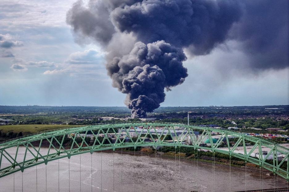 Warehouse Inferno Erupts, Sending Thick Ash Clouds into the Sky as Major Incident Declared