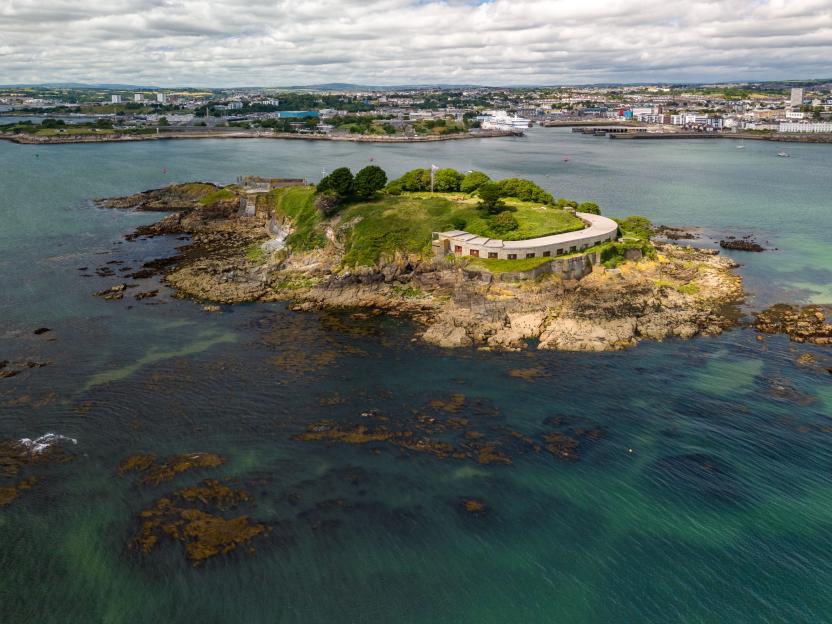 Aerial view of Drake's Island fort and Plymouth city.
