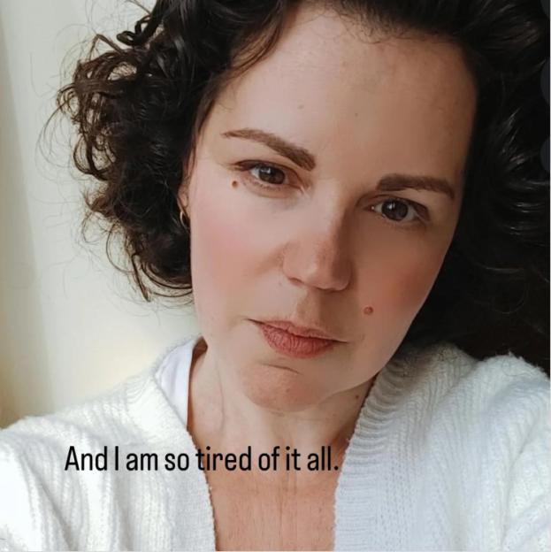 Dr. Philippa Kaye, with curly dark hair, wearing a white cardigan and looking tired, with text that reads "And I am so tired of it all."