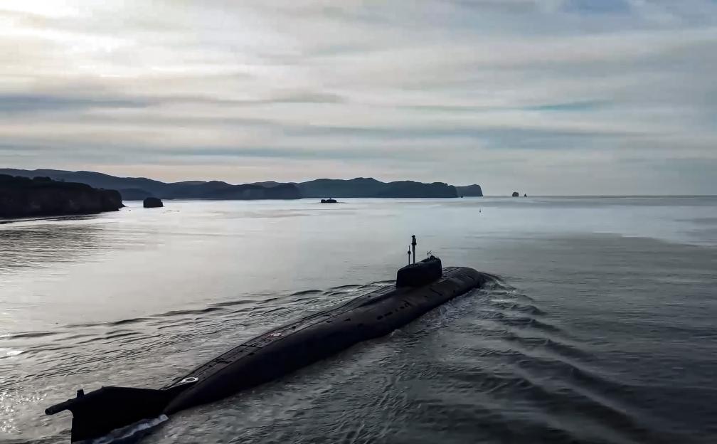 a submarine is floating on top of a body of water