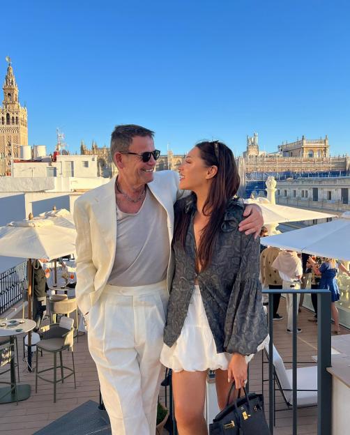 Lorna Luxe and her husband John Andrews on a rooftop in Seville.