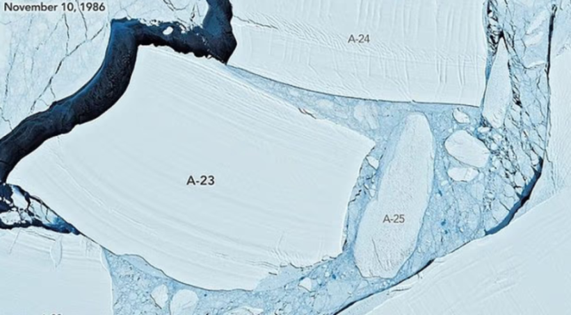 An aerial view of iceberg A-23 with smaller chunks of ice (A-24 and A-25) breaking off.