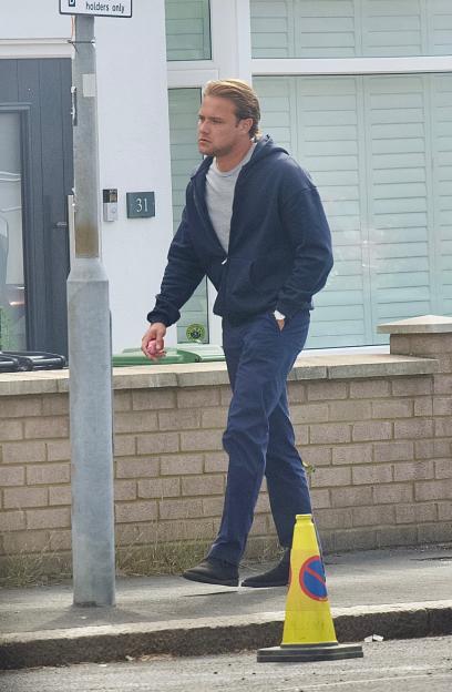 Actor Craig Ingram filming EastEnders at Elstree.