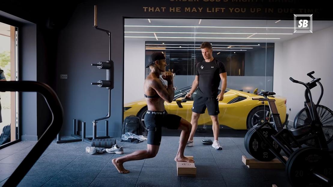 Step Inside Conor Benn’s Luxurious New Gym Featuring a Stunning Ferrari as He Prepares for His World Title Fight!
