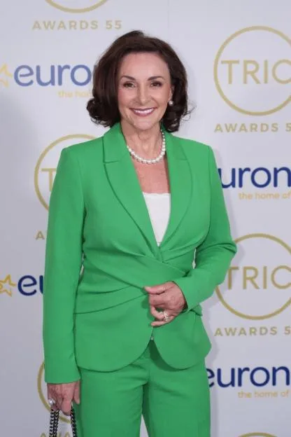 Shirley Ballas wearing a green suit at an awards ceremony.