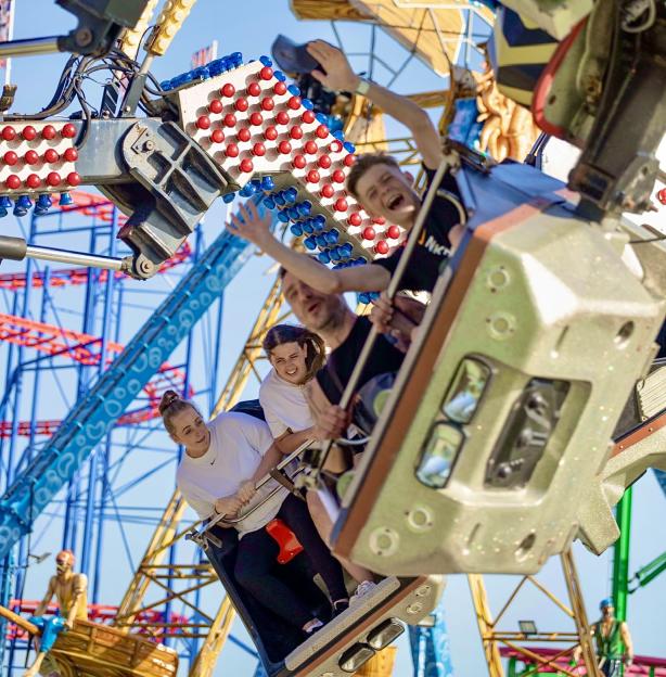 People on a spinning ride at Brean Theme Park.