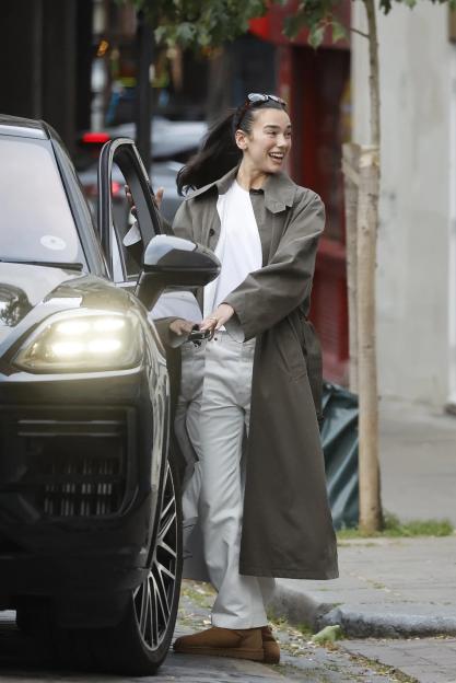 Dua Lipa and Callum Turner on a stroll in London.