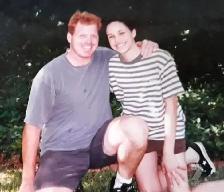 A younger Meghan Markle posing outdoors with her brother, Thomas Markle Jnr.