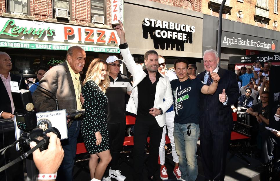 John Travolta, Kelly Preston, and others celebrate at Lenny's Pizza.