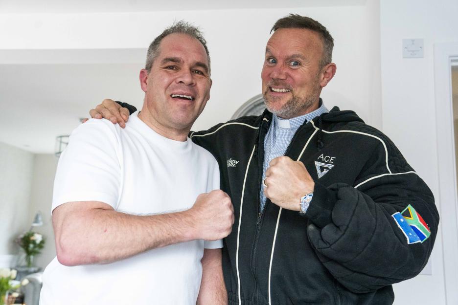 Kirk Gittens (left) with Motor Neuron Disease, and Rev Warren Furman (right), a Church of England Vicar.