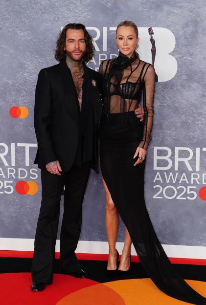Pete Wicks and Anna Vakili on the red carpet at The BRIT Awards 2025.