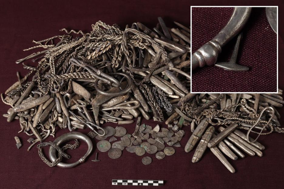 Homeowner Uncovers Denmark's Biggest Viking Silver Treasure, Complete with Mini Thor's Hammer, While Gardening!