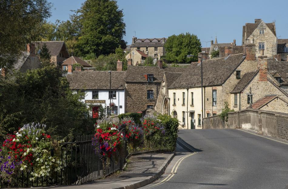 Floral decoration over St Johns Bridge in Malmesbury, Wiltshire, England.