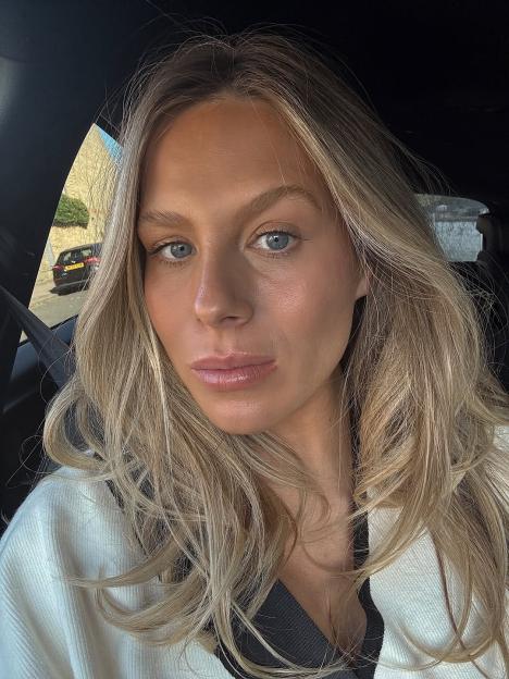 Reality star in a car.