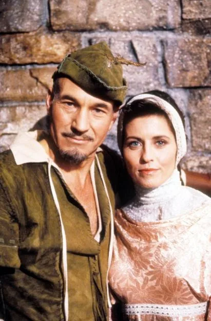 Patrick Stewart as Robin Hood and Jennifer Hetrick as Vash in Star Trek: The Next Generation.