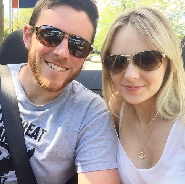 Police officer Andrew Harper and his wife, Lissie, both wearing sunglasses.