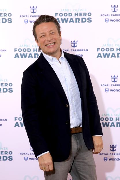 Jamie Oliver smiling at the Jamie Oliver Food Hero Awards.