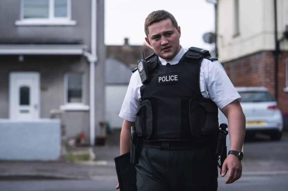 Finnian Garbutt as a police officer in Hope Street.