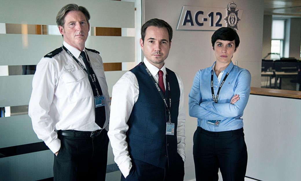 Adrian Dunbar, Martin Compston, and Vicky McClure as police officers in the drama "Line of Duty".