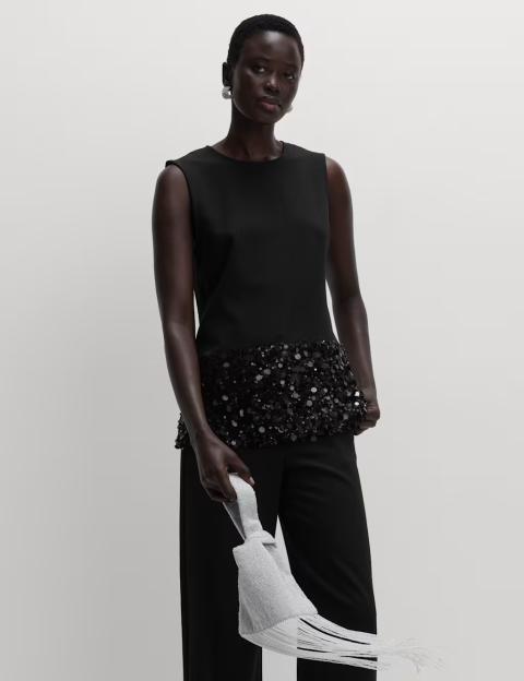 Discover M&S's Five-Star 'Must-Have' Party Top: Classy, Elegant, and Perfectly Paired with Matching Trousers!