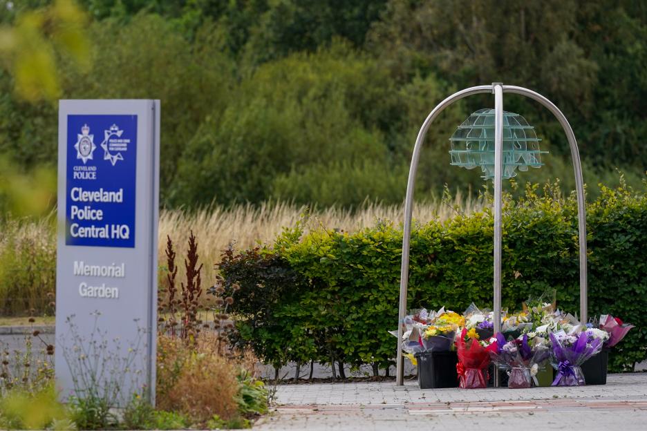 Floral tributes left at the Cleveland Police Central Headquarters Memorial Garden.