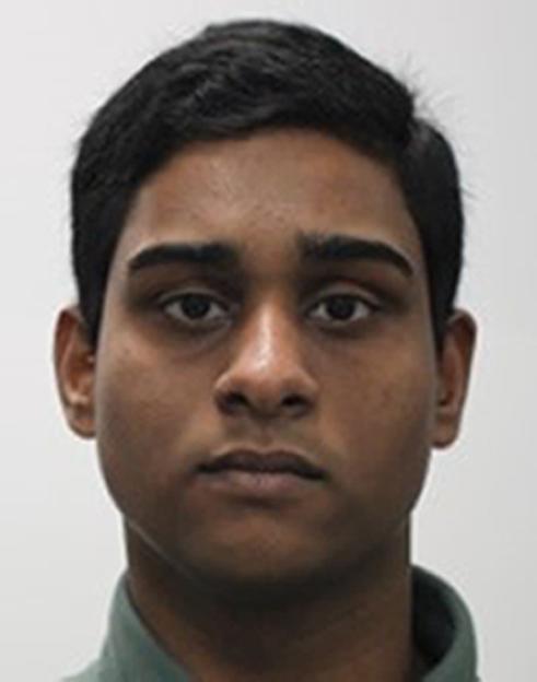 Headshot of Dihan Rahman, a man with dark hair and eyes, wearing a collared shirt.