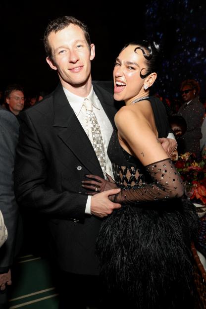 Callum Turner and Dua Lipa posing at the 2025 Met Gala.