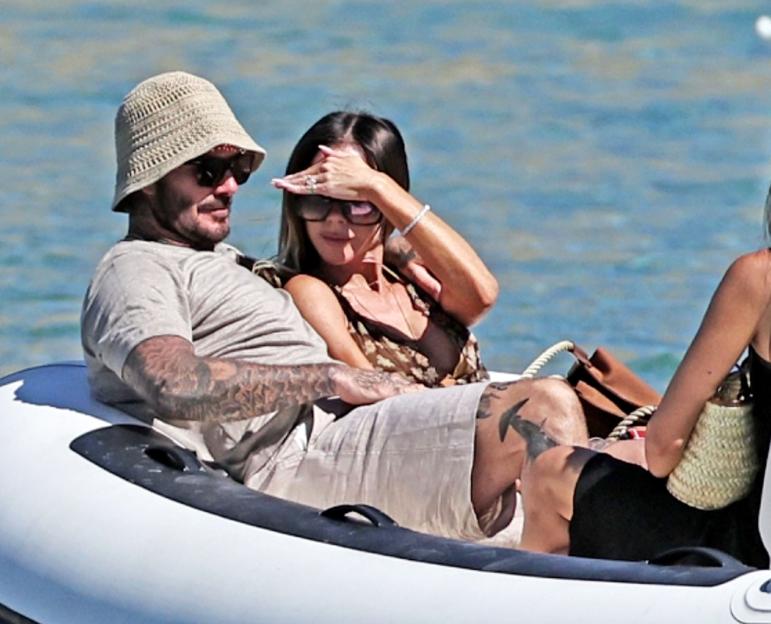 *PREMIUM-EXCLUSIVE* MUST CALL FOR PRICING BEFORE USAGE - Sir David Beckham and Victoria Beckham were spotted soaking up the sunshine during a glamorous family getaway in Ibiza over the Bank Holiday Weekend, joined by son Romeo Beckham, his girlfriend