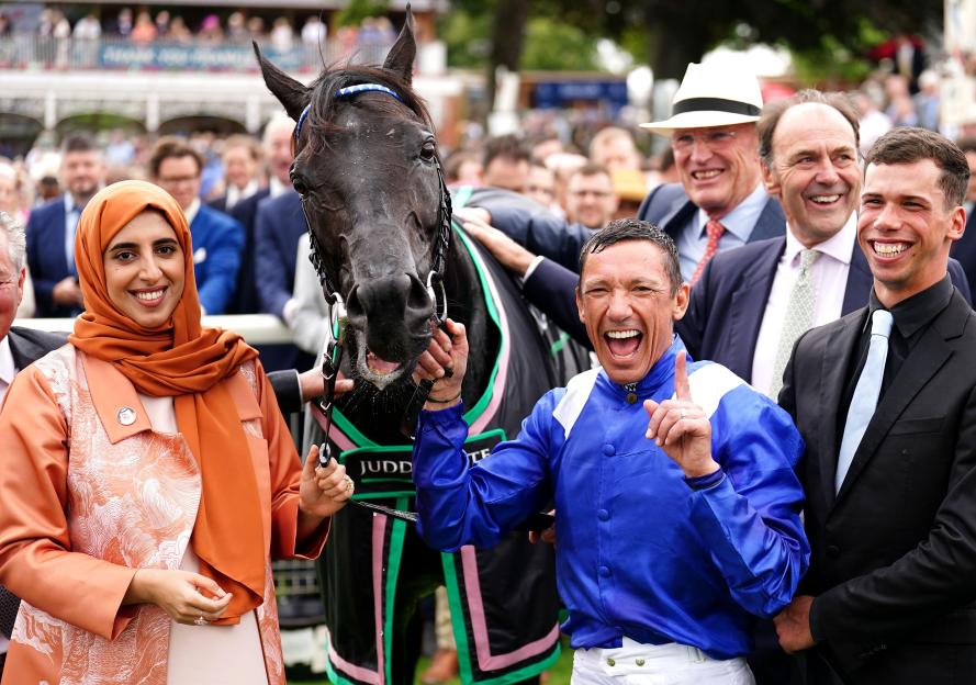 Jockey Frankie Dettori, owner Sheikha Hissa bint Hamdan bin Rashid al-Maktoum, and others with horse Mostahdaf after winning the Juddmonte International Stakes.