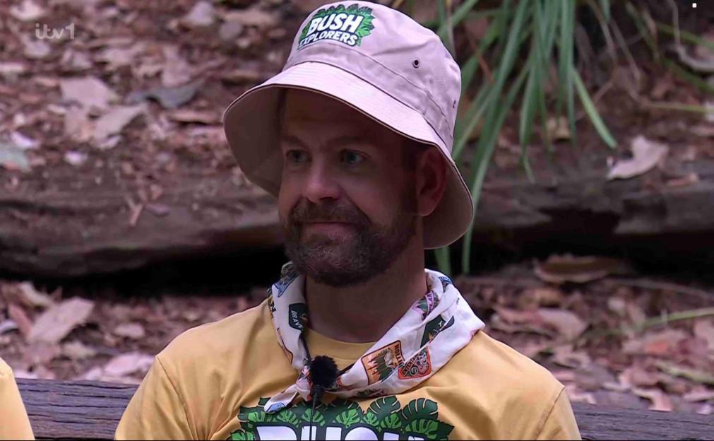 Jack Osbourne in a "Bush Explorers" bucket hat and yellow shirt.