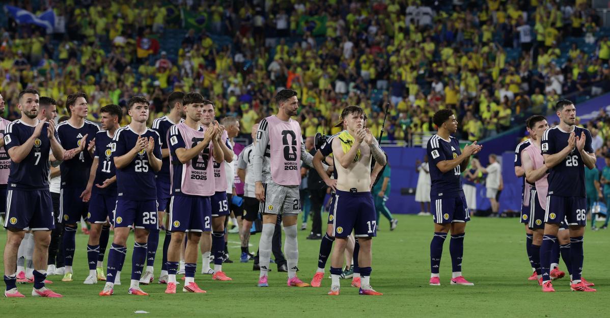 FLORIDA, UNITED STATES OF AMERICA, June 24: Scotland players looks disappointed & dejected at the full time whistle during the FIFA World Cup 2026 match in Group C between Scotland v Brazil at Miami Stadium, Miami, Florida, on 24 June. (Photo by DC P