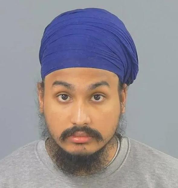 Vickrum Digwa in a mugshot.