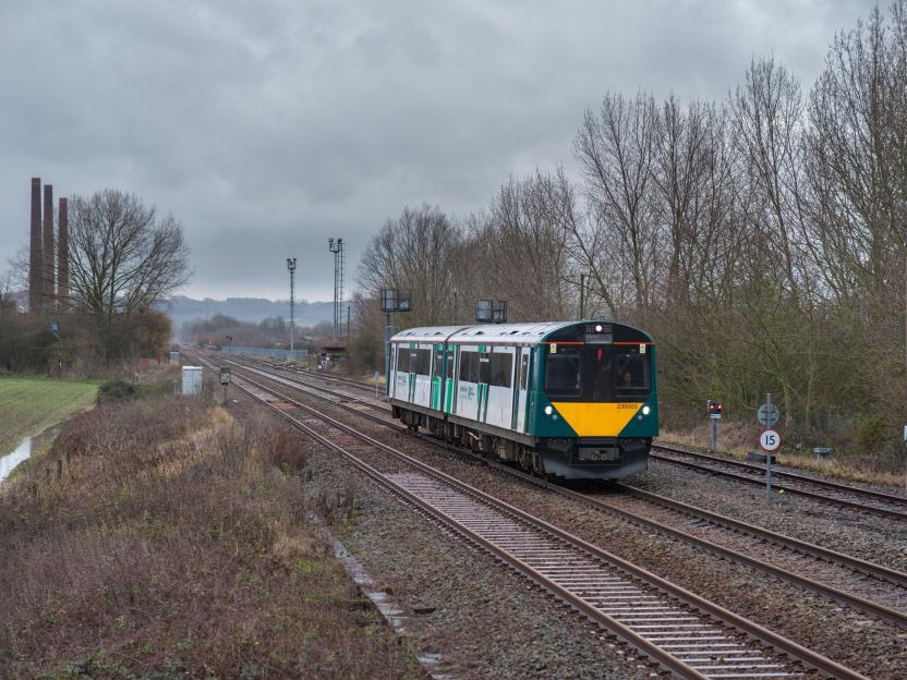 West Midlands Railway Vivarail class 230 passing Forders sidings, Stewartby on the Marston vale Bedford to Bletchley railway line