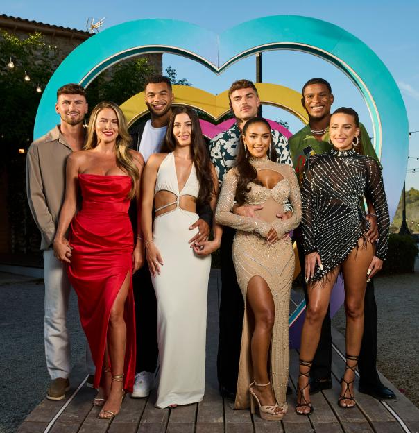 Four couples from Love Island Series 12 posing for a photo.