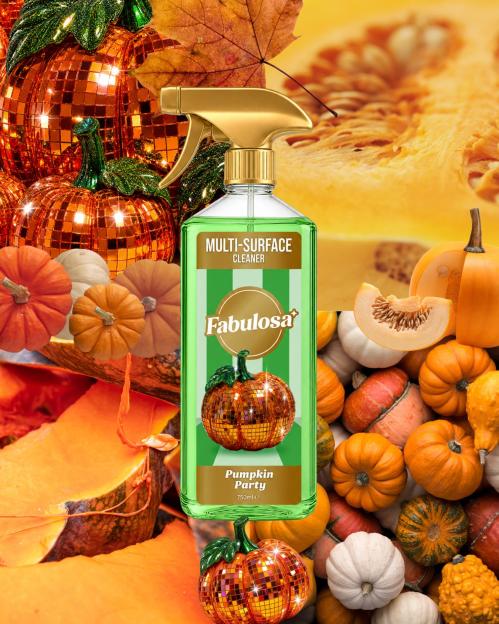 Fabulosa cleaning product bottle with a "Pumpkin Party" scent, surrounded by pumpkins and gourds.