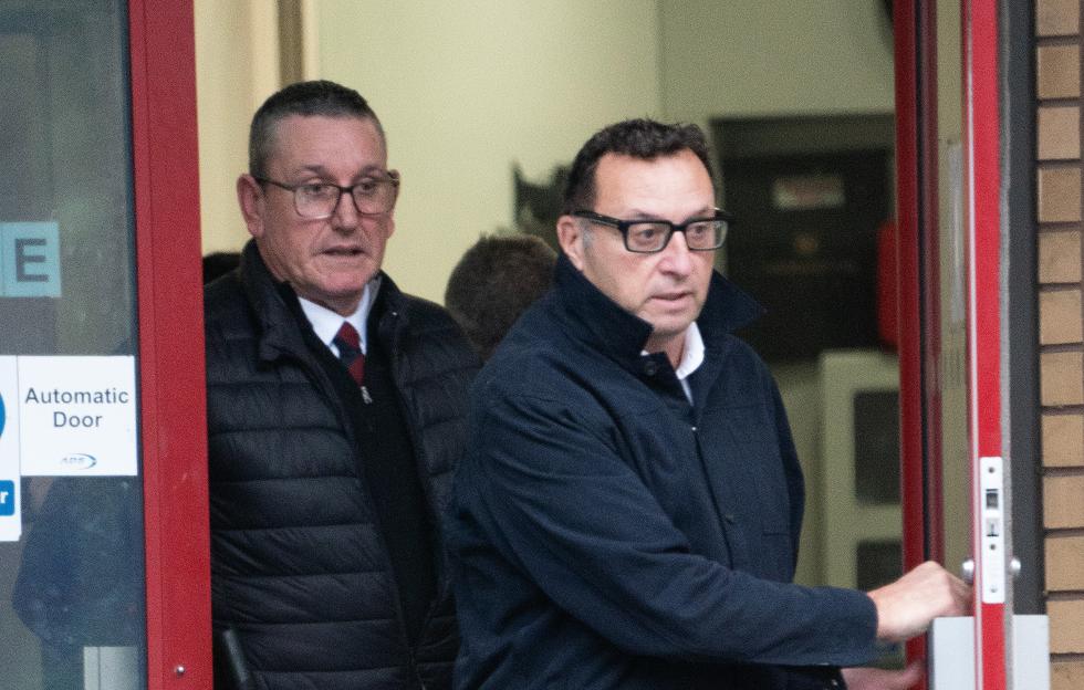 Phillip Jones and Gareth Lloyd exiting Cardiff Crown Court.