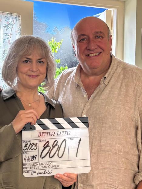 Ruth Jones and a male actor holding a clapperboard for the new BBC comedy "Better Later".
