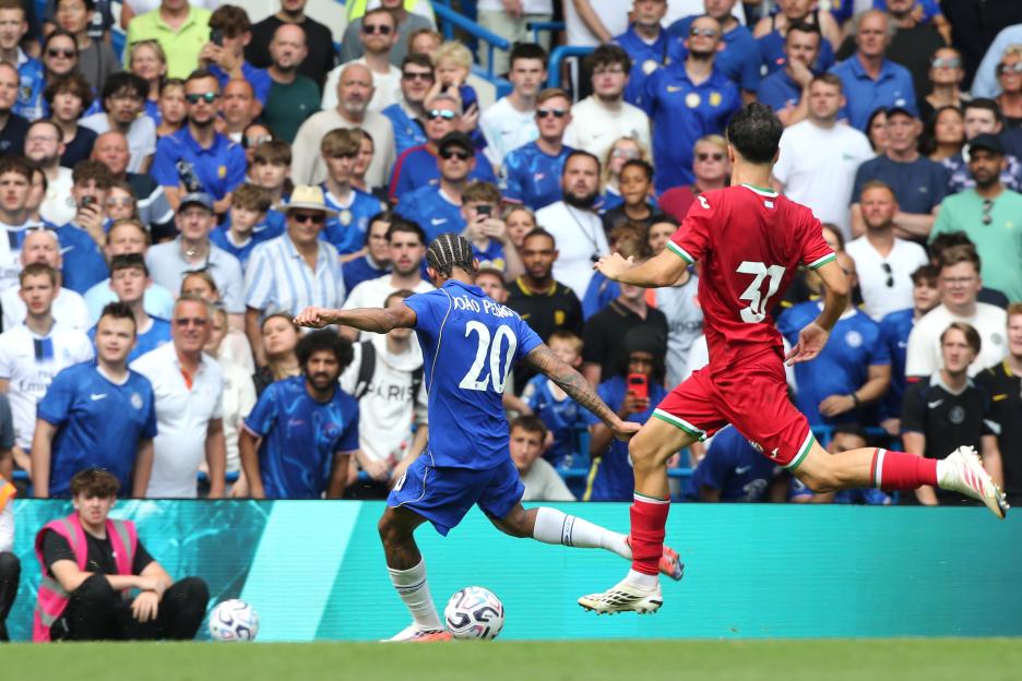 Joao Pedro of Chelsea scores a goal during a football match against Real Sociedad.
