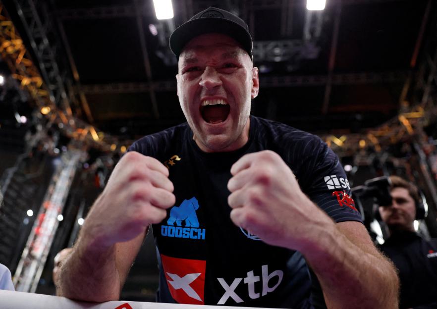 Tyson Fury celebrating his victory against Arslanbek Makhmudov.