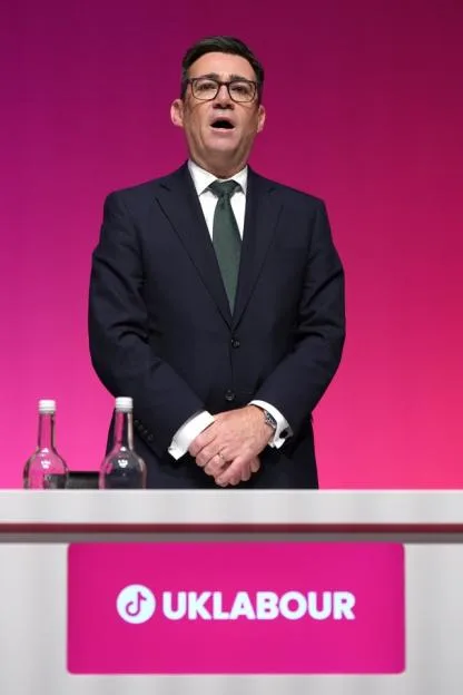 Prime Minister Andy Burnham sings during the Labour Party Conference.